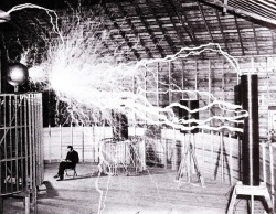 Multiple exposure publicity picture of Tesla sitting in his Colorado