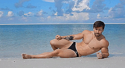 bigmusclestuds:  Big stud Jake Burton posing on the beach