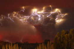 Lightning flashes around the ash plume above the Puyehue-Cordon