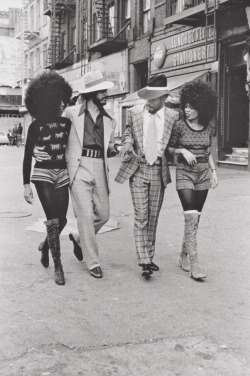 historicaltimes:  Two Afro couples walk the streets of NYC; part