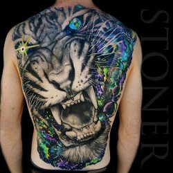 tattoosnob:  Space Tiger back piece by @adam_stoner at @theruemorguetattoogallery