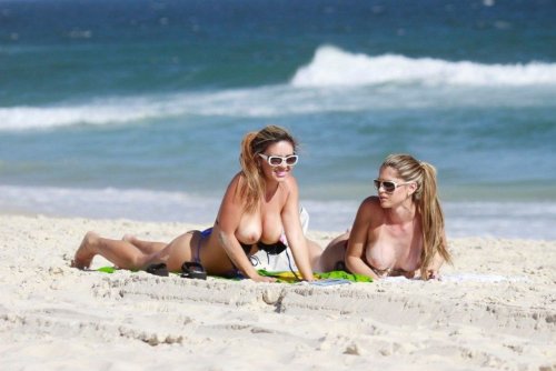 toplessbeachcelebs:Fernanda Araldi and Larissa GomesÂ sunbathing topless in Barra da Tijuca, Rio de JaneiroÂ (January 2014)