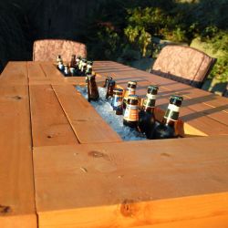 themadbutcherofkingsburyrun:  Patio table with built in beer