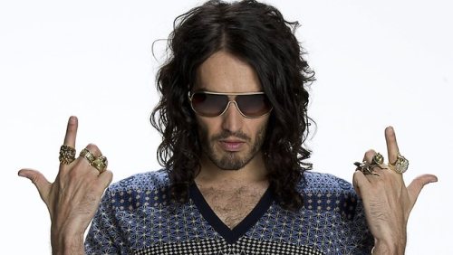 <p><em><strong>Russell Brand’s Uncomfortable NAZI Jokes At The London GQ Show….  Targeting German Brand, Hugo Boss!! </strong></em></p>
<p><em>Could the London <strong>GQ</strong> awards been anymore uncomfortable? The show took an unexpected turn as comedian Russell Brand takes stage and makes <strong>NAZI</strong> jokes that were targeted at <strong>GQ</strong> sponsor and german brand, <strong>Hugo Boss…</strong></em></p>
<p><em>Russell Brand was presented with the ~Oracle~ award at the <strong>Royal Opera House In London.</strong> This award was a <strong>GQ</strong> men of the year recognition. Russell Brand had taken stage after mayor, Boris Johnson made his acceptance speech. The mayor had <strong>allegedly</strong> made jokes during the speech given while receiving the GQ award. <strong>Allegedly,</strong> the jokes were in reference to the chemical weapons in Syria. When Russell Brand took stage by accepting his award this is what he stated: <strong>“Glad to grace the stage where Boris Johnson has just made light of the use of chemical weapons in Syria. Meaning that GQ can now stand for the genocide quips. "I mention that only to make the next comment a bit lighter because if any of you know a little bit about history and fashion, you’ll know Hugo Boss made the uniforms for the Nazis.” But they did look f****** fantastic, lets face it, while they were killing people on the basis of their religion and sexuality.“ </strong></em><br/></p>
<p><em>Oh… but Russell Brand didn’t stop there!! Because he had a lot more to say. However, not until he took his defense by writing to the <strong>Guardian</strong> about the comments that had been made towards the <strong>german brand, Hugo Boss. </strong>He stated that the jokes were not a campaign to destroy the brand. Which Russell also happens to make this statement in regards to the brand by saying, it
