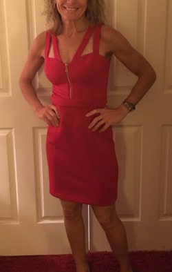 oregoncuckold:  My wife looks great in and out of the hot red dress that @dentistdave bought for her.Â  Oregoncuckold10-6-16