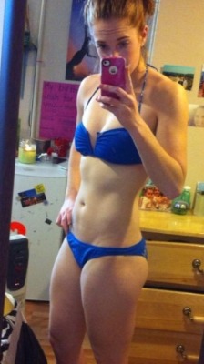 redhead in blue bikini