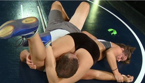 submissionwrestlerr:A friend of mine wrestling her boyfriend, they tend to do this often and get me to take the pictures