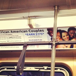 On the train, African American lesbian couple on the right. So
