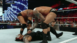 Roman Reigns suffering at the hands of Evolution…yeah this