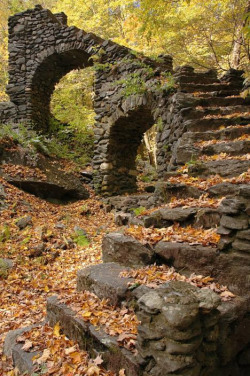 sixpenceee:A stairway located in the woods. This is in Madame