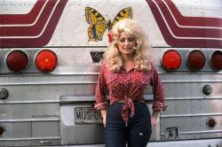 retropopcult:Dolly Parton in front of her tour bus, 1977