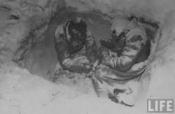 Pair of Russian soldiers frozen to death in their fighting hole