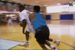 gotemcoach:  Young Shaq pulls a basketball hoop off of a backboard. 