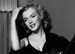ourmarilynmonroe:  Marilyn Monroe outside of her apartment being