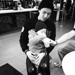 melonhun: a baby holding a baby