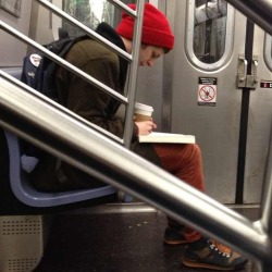 howdiditgoagain:   Michael Cera calmly reading on the train 