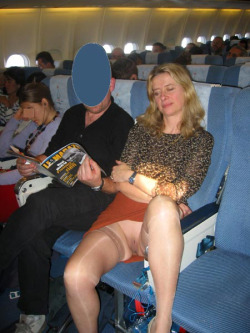 airplane-flashers:  Love it!  Thigh highs AND no panties on