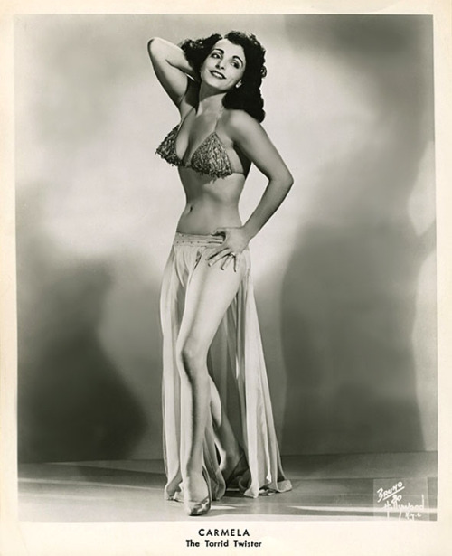 Carmella aka. “The Torrid Twister”..