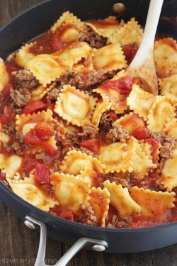 craving-nomz:  Cheesy Ravioli and Italian Sausage Skillet