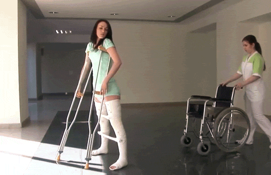 Sexy female patient gets two LLC, with wheelchair and crutches (Medical Fetish & Bondage GIFs)from http://www.bracedlife.com