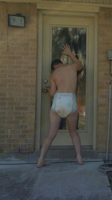 diaperednerd:Jared furiously jiggled the door handle, but of course it was locked. Â  He peered through the glass to see if anyone would let him in. Â His cousin was waiting calmly on the other side of the door, eating a bowl of cereal. Â Jared banged