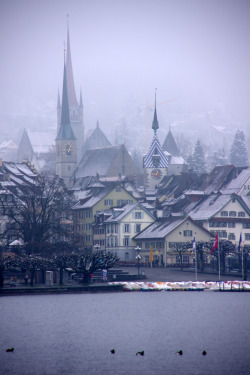 refluent:  City in mist (Zug, Switzerland) (by armxesde) 