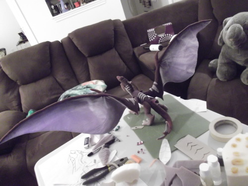 foamaddict:  WIP #3 The End is NEAR! Almost done, he’s got his stripes, spikes, scales, chompers and everything besides his legs are glued down. Just the eyes (poor eyeless bugger) and claws left to do. And a bit of ironing on his poor wrinkled wings.