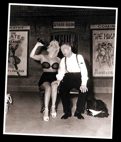   Jean Carroll     (aka. Mary Henrici) Vintage 50’s-era press photo features Jean performing with her husband: baggy-pants comic Bob Carney.. The pair excelled in Burly-Q comic sketches; and toured regularly together.. By ‘48, they’d