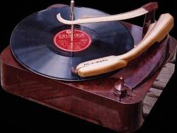1948, Columbia Records introduces the 33 ⅓ -RPM long player.