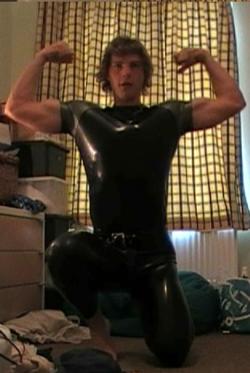 2manykinks:  Love seeing this muscle stud in tight rubber.  Especially