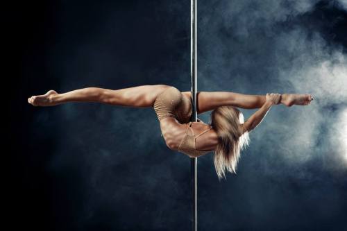 Muscular Pole Dancers Legs
