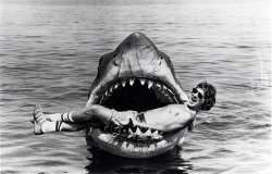 Steven Spielberg smiling and relaxing in the jaws of Bruce the