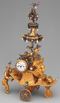 ufansius: Gold automaton in the form of a chariot bearing a clock