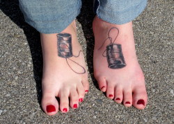 fuckyeahtattoos:   My best friend of 13 years and I got coordinating tin can telephones tattooed on our feet. They were done in october on my 18th birthday by Britton Ashbury of Blue Byrd Tattoo in Dayton, Ohio. We both absolutely love the way they turned