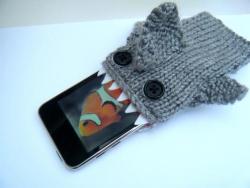 thedailywhat:   Buy This: Shark iPod cozy from Etsy seller Chris and Yaya. 100% grey acrylic yarn. Fits iPhones, iTouches, and iPod Classics as sold. Custom fitting available upon request. [walyou.]   OM NOM NOM IPOOOOD.