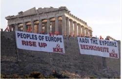 Giant banners protesting Greece’s austerity measures hang near