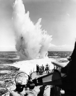 USS Philip (DDE-498) Depth charge explodes astern, during operations