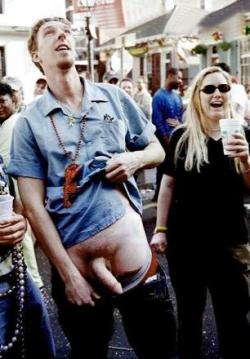 Showing his dick for beads at Mardi Gras.