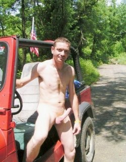 A boned-up ginger and his jeep.