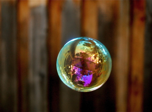 onegirlonecamera:  My world was like a bubble.  Pretty, but temporary.  The slightest shift could cause it to burst apart. 