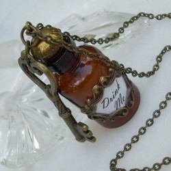 alices1derland:  Alice ‘Drink Me’ Bottle Pendant | from TrashAndTrinkets