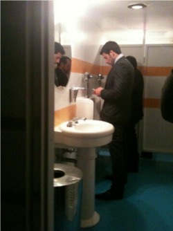 fuckyeahgiamani:  Leo texting while peeing at the Raleigh Hotel,