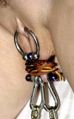 pussymodsgalore:  Large ring in clithood, bar with shackles through