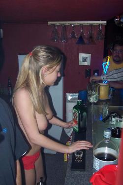 skumora:  Topless bartender Definitely beats the bar tender in