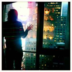 Manny and the view from our hotel room on NYC - Marriott Marquis,