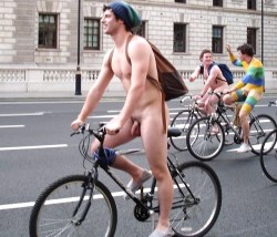 Hot nude dude on a bicycle.