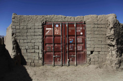 “A door made from a shipping container marks the entrance