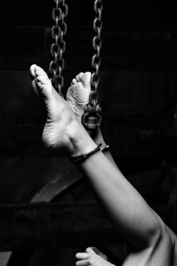 Shackled feet