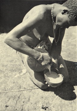 anthropologica:  anthropologica:  A woman pours beer for her