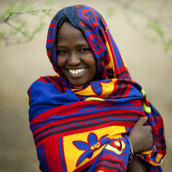 allineedislipstick:  Veiled Karrayu girl smiling, Ethiopia by